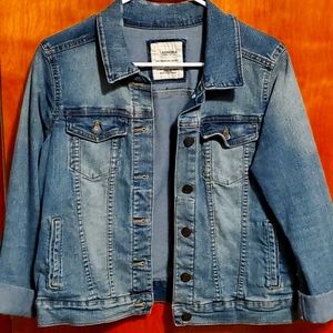 Long sleeve denim jaket in size Medium.